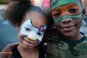 children with faces painted